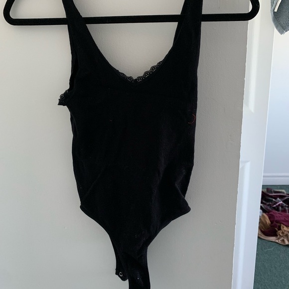 I’m selling this super cute body suit in black! - Picture 1 of 3
